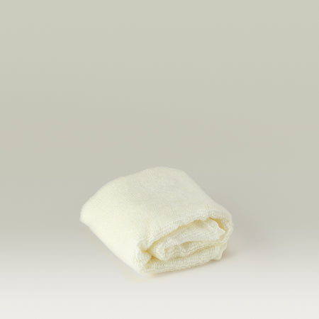 Tropic Bamboo Face Cloth folded neatly, made from soft and sustainable bamboo fabric for gentle cleansing.
