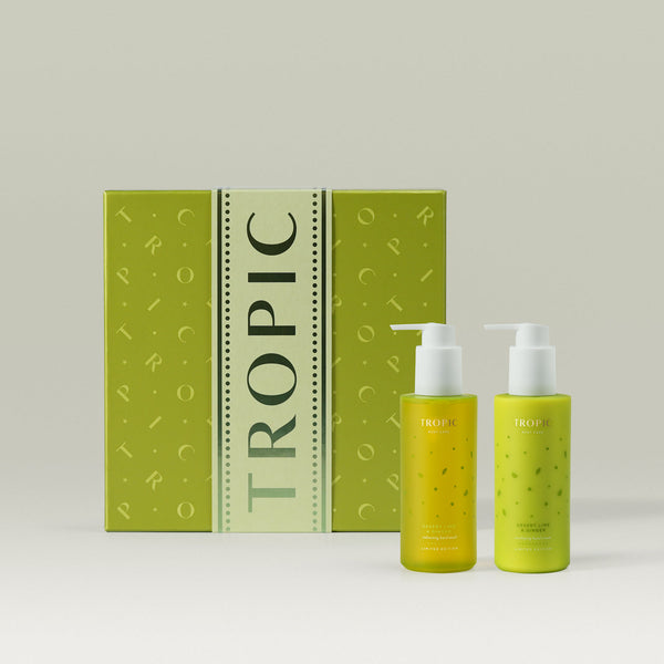 Tropic Skincare gift set titled Desert Lime & Ginger – winter hand collection, featuring two nourishing hand care products in fresh citrus green bottles, displayed alongside a matching green gift box.