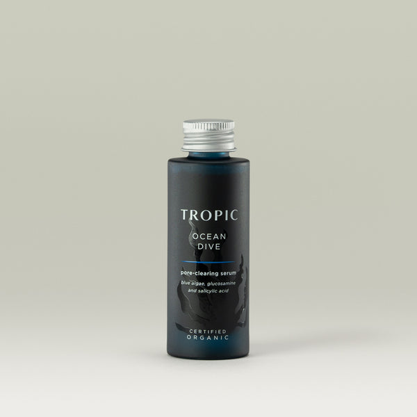 Tropic Ocean Dive pore-clearing serum refill.  Contains blue algae, glucosamine and salicylic acid. Certified Organic.
Aluminium screw cap. Dark blue glass bottle with leaf design behind the white text.