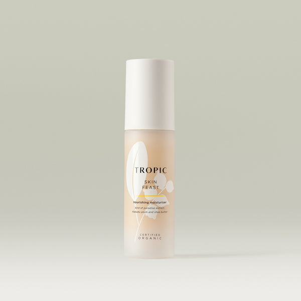 Skin Feast nourishing moisturiser contain birds of paradise extract, Kakadu plum extract and shea butter.
Certified Organic.
White plastic lid with glass bottle. White leaf design features behind black text.