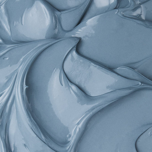 Close-up texture of Tropic’s New Horizons blemish-clearing mask, showing its smooth, rich blue formula designed to purify and clarify the skin.