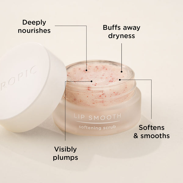 Image shows Lip Smooth with the lid open . This product deeply nourishes, buffs away dryness, visibly plumps, softens & smooths.