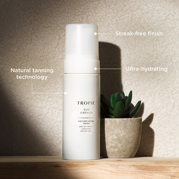 
The image displays a bottle of Tropic 