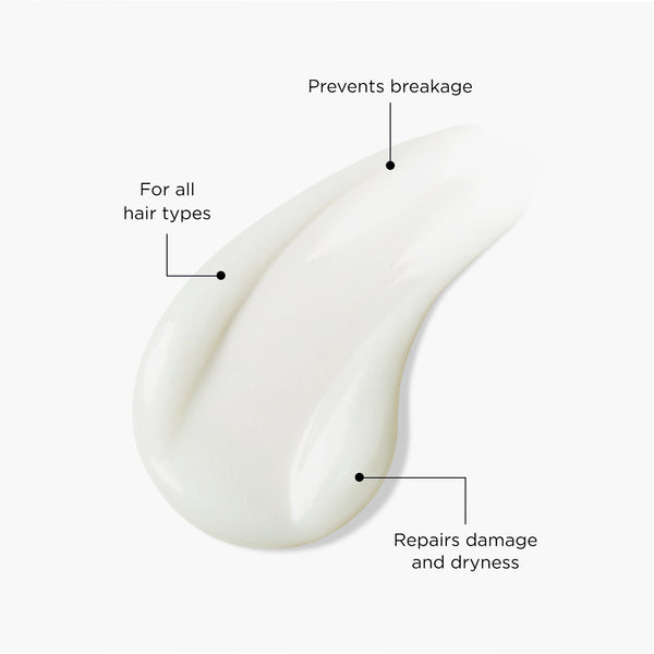 Creamy white texture swatch of hair cleanser annotated with usps; for all hair types, prevents breakage, repairs damage and dryness.