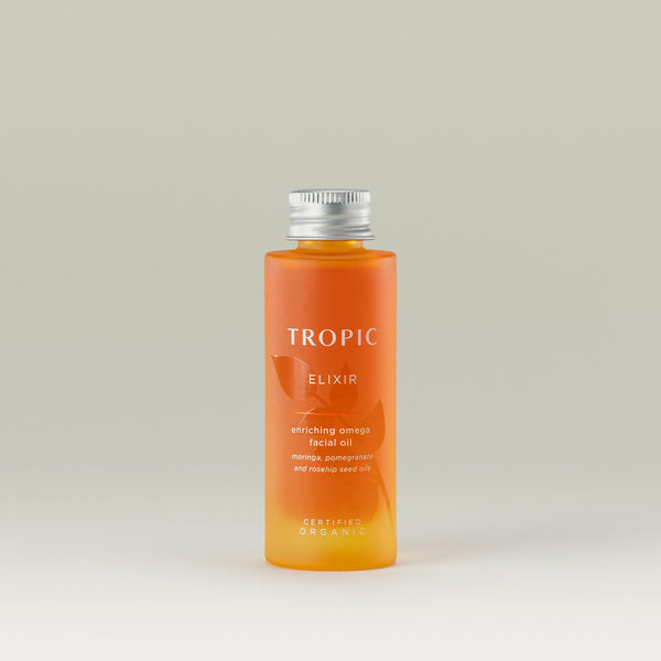 Tropic Elixir enriching omega facial oil Refill. Moringa, pomegranate and rosehip seed oils.
Certified Organic.
Glass bottle that is orange due to the product colour. A embossed leaf features behind white text.