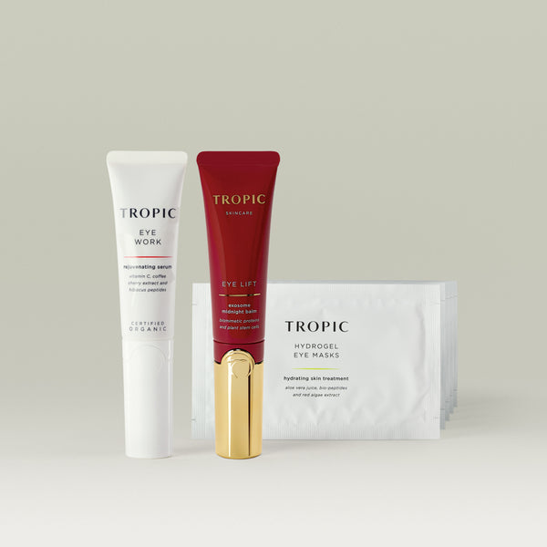 Tropic Skincare eye care collection featuring Eye Work Rejuvenating Serum, Eye Lift Exosome Midnight Balm, and 5 x Hydrogel Eye Masks.