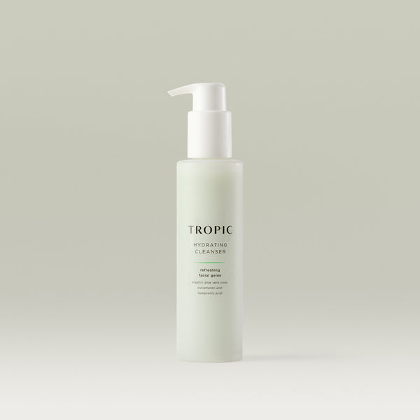 Tropic Hydrating Cleanser bottle with pump dispenser, containing refreshing facial gelée made with organic aloe vera juice, cucumber, and hyaluronic acid, displayed on a neutral background