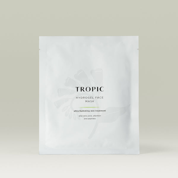 Tropic Hydrogel Face Mask in a white packet, labelled as an ultra-hydrating skin treatment with aloe vera juice, allantoin, and peptides, displayed on a neutral background.