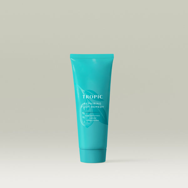 Tropic Repairing Foot Remedy. Turquoise tube with leaf design behind white text.
