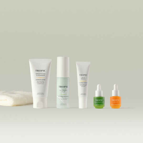 Nourish Skincare Discovery Kit showing
Features a Bamboo Cloth, Smoothing Cleanser, Morning Mist, Skin Feast, Elixir, Rainforest Dew. Against a grey backdrop.
