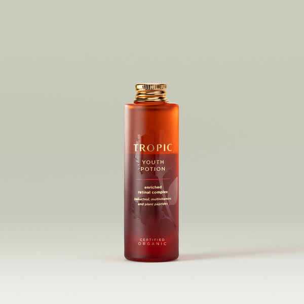 30ml refill bottle of Tropic Youth Potion enriched retinal complex, with a gold cap, displayed on a neutral background.