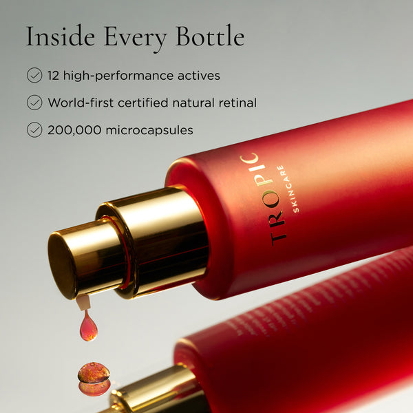 Red Tropic bottle with serum drop, highlighting key actives and advanced retinal formula inside.
